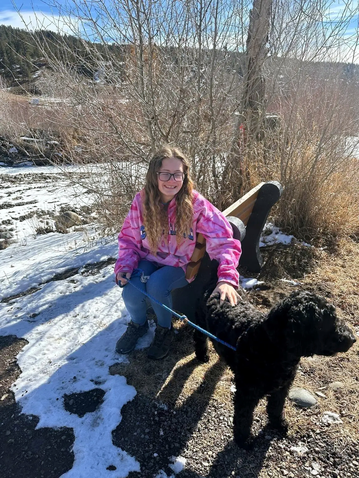 Bre from the Woof Creek Dog Care team